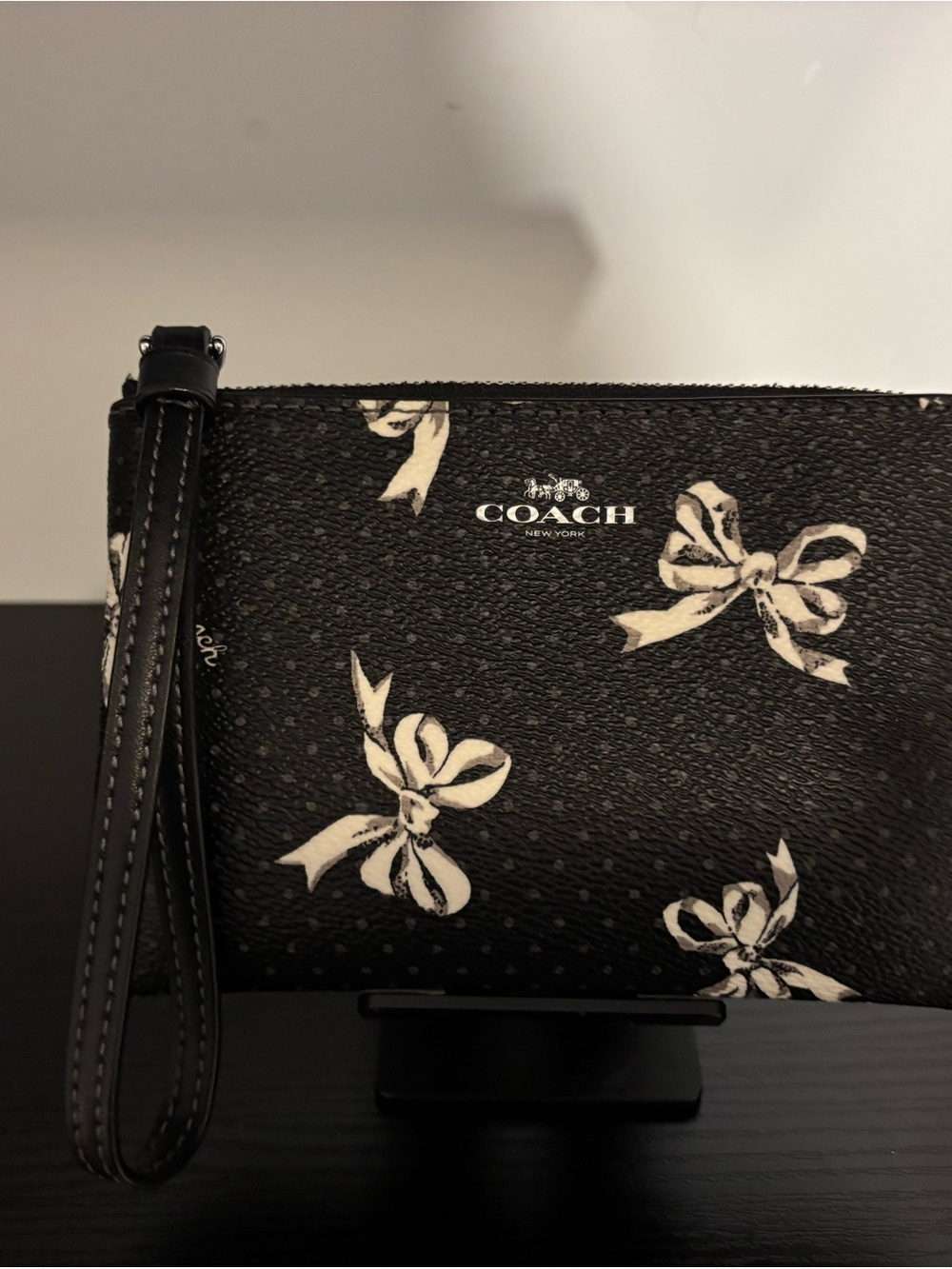 Coach Black Wristlet with White Bow Print